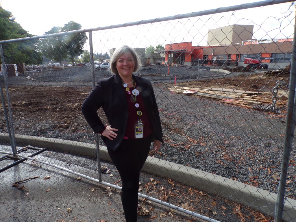 St. Helens High School Principal Katy Wagner poses outside the school.